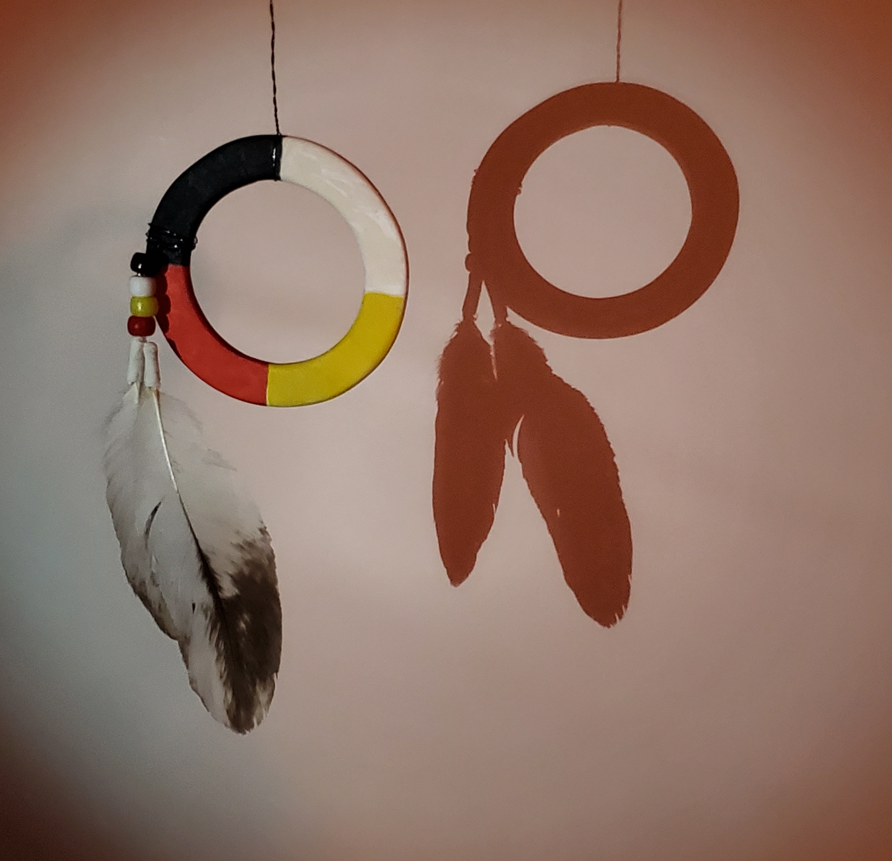 The letter 'R', made by a Medicine Wheel