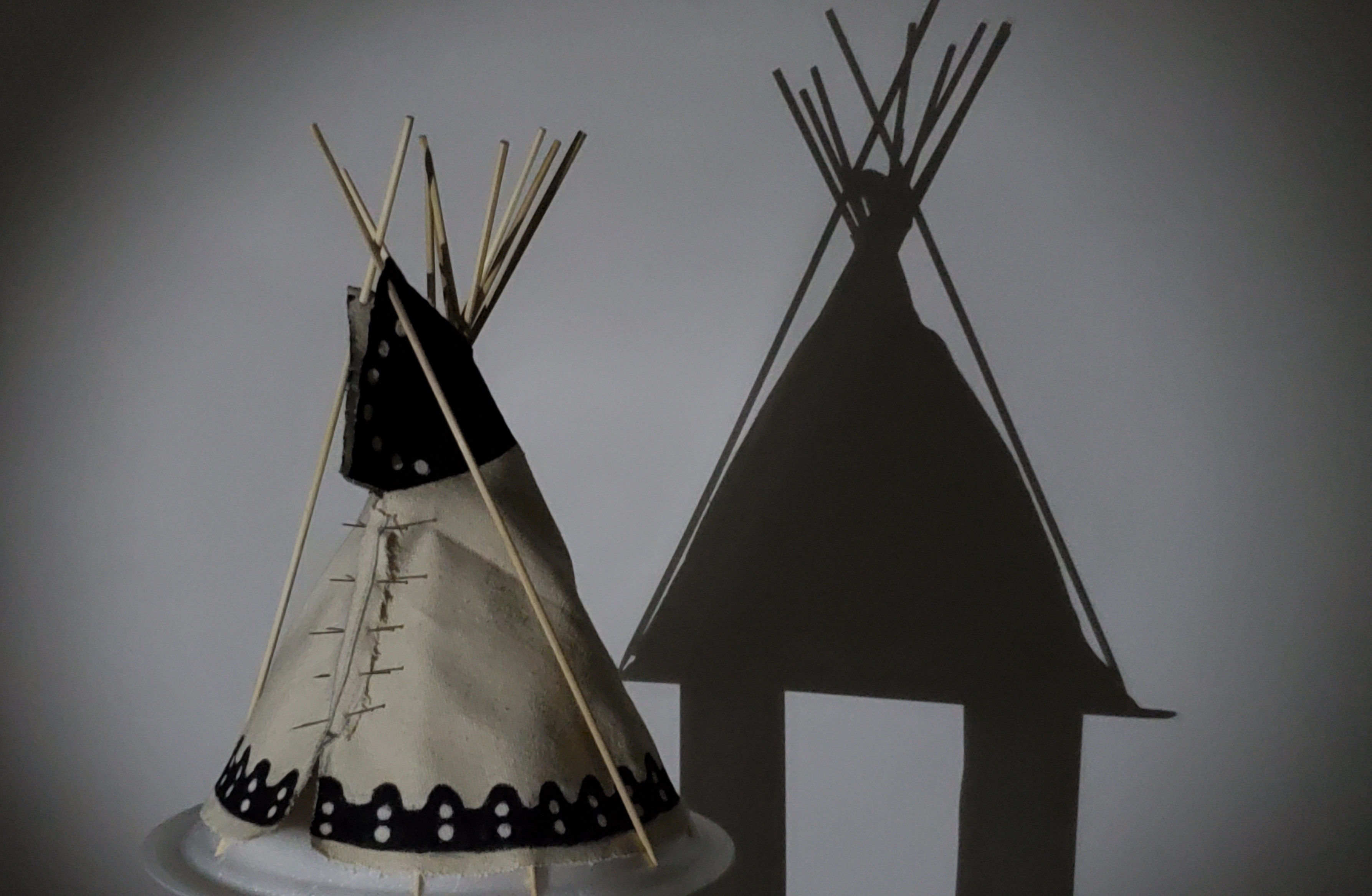The letter 'A', made by a teepee